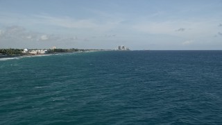 5K aerial stock footage of flying by the coast, approaching Palm Beach Shores, Florida Aerial Stock Footage | AX0032_105