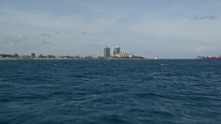 5K aerial stock footage of flying over the Atlantic Ocean, revealing Palm Beach Shores, Florida Aerial Stock Footage | AX0032_108