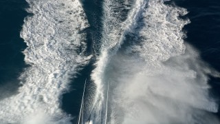 AX0032_114 - 5K aerial stock footage fly by fishing boat cruising the Atlantic Ocean, Palm Beach Shores, Florida