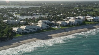 5K aerial stock footage of approaching coastal condominium complex, North Palm Beach, Florida Aerial Stock Footage | AX0032_123