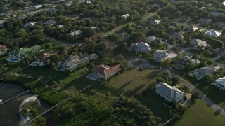 5K aerial stock footage of flying by a residential neighborhood, Stuart, Florida Aerial Stock Footage | AX0032_156