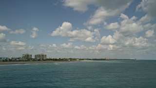 AX0033_036E - 5K aerial stock footage of flying by residential area on the coast, Fort Pierce, Florida