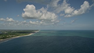 AX0033_059 - 5K aerial stock footage of approaching the beach from high above the ocean, Vero Beach, Florida