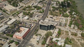 5K aerial stock footage of approaching an intersection among office buildings, Melbourne, Florida Aerial Stock Footage | AX0033_076