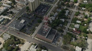 5K aerial stock footage of approaching a radio tower in a small city, Melbourne, Florida Aerial Stock Footage | AX0033_077