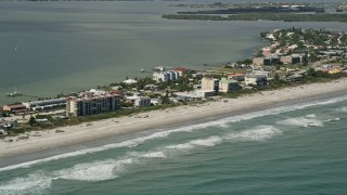 5K aerial stock footage of the beach with condominiums, Cocoa Beach, Florida Aerial Stock Footage | AX0034_008