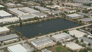 5K aerial stock footage of toy speedboat in a pondo, Orlando, Florida Aerial Stock Footage | AX0035_009