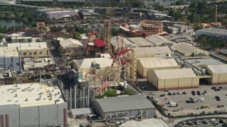 AX0035_016 - 5K aerial stock footage of a roller coaster at Universal Studios Florida, Orlando, Florida