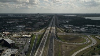 5K aerial stock footage of following an interstate with light traffic, Orlando, Florida Aerial Stock Footage | AX0035_027E