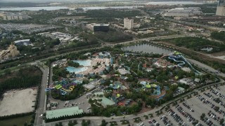 AX0035_033E - 5K aerial stock footage of orbiting Aquatica Florida water park, Orlando, Florida