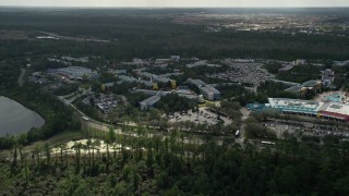 5K aerial stock footage of approaching Disney's All Star Sports Resort, Orlando, Florida Aerial Stock Footage | AX0035_044