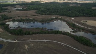 5K aerial stock footage approach a small lake in Clermont, Florida Aerial Stock Footage | AX0035_087