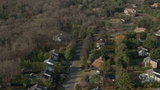 5K aerial stock footage flyby a suburban homes in Syosset, Long Island, New York, winter Aerial Stock Footage | AX0065_0015