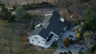 5K aerial stock footage of an upscale home in Syosset, Long Island, New York, winter Aerial Stock Footage | AX0065_0015N