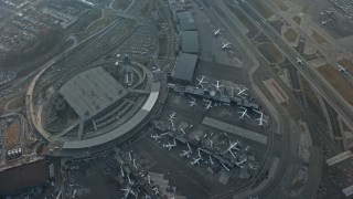 5K aerial stock footage of a bird's eye view of LaGuardia Airport, Queens, New York City, winter Aerial Stock Footage | AX0065_0037E