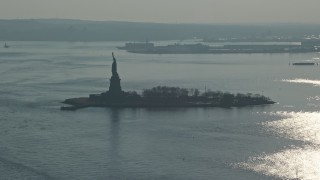 5K aerial stock footage approach the Statue of Liberty, New York, winter Aerial Stock Footage | AX0065_0074