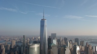 5K aerial stock footage approach and flyby One World Trade Center and Lower Manhattan skyscrapers from the Hudson River, New York City, winter Aerial Stock Footage | AX0065_0135E