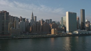 5K aerial stock footage of United Nations and skyscrapers in Midtown Manhattan, New York City, winter Aerial Stock Footage | AX0065_0165E