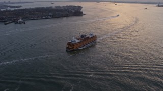 5K aerial stock footage track a Staten Island Ferry sailing New York Harbor, winter, twilight Aerial Stock Footage | AX0065_0181