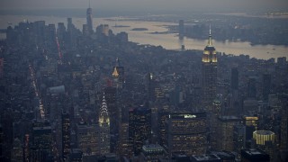 5K aerial stock footage of the Empire State Building in Midtown Manhattan, New York City, winter, twilight Aerial Stock Footage | AX0065_0240