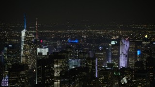 5K aerial stock footage flyby skyscrapers in Midtown Manhattan, New York City, winter, night Aerial Stock Footage | AX0065_0360E