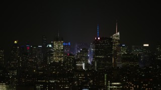 5K aerial stock footage of the skyline of Midtown Manhattan, New York City, winter, night Aerial Stock Footage | AX0065_0371