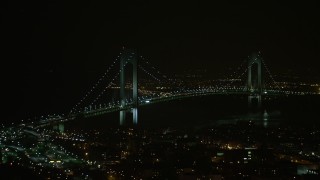 5K aerial stock footage flyby the Verrazano-Narrows Bridge in New York City, winter, night Aerial Stock Footage | AX0065_0398