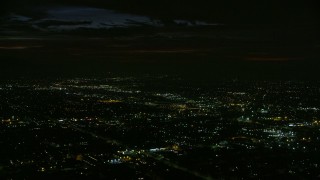 7.6K aerial stock footage passing suburban neighborhoods at night in Burbank, California Aerial Stock Footage | AX0156_002