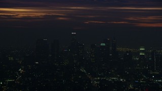 7.6K aerial stock footage of tall Downtown Los Angeles skyscrapers at sunrise, California Aerial Stock Footage | AX0156_026