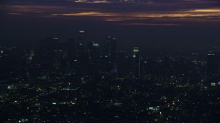 7.6K aerial stock footage flying by Downtown Los Angeles high-rises at sunrise, California Aerial Stock Footage | AX0156_029