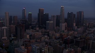 7.6K aerial stock footage flying by giant skyscrapers in Downtown Los Angeles at sunrise, California Aerial Stock Footage | AX0156_059