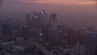 AX0156_064E - 7.6K aerial stock footage of Downtown Los Angeles, California as the sun rises