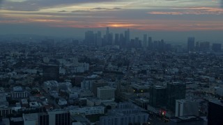 7.6K aerial stock footage approaching the Downtown Los Angeles, California skyline on a hazy morning Aerial Stock Footage | AX0156_082E