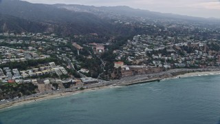 7.6K aerial stock footage of light morning traffic on Pacific Coast Highway in Pacific Palisades, California Aerial Stock Footage | AX0156_165