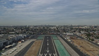 7.6K aerial stock footage taking off from Hawthorne Airport and fly over residential area, Hawthorne, California Aerial Stock Footage | AX0157_001