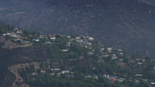 7.6K aerial stock footage of hillside homes in the Santa Monica Mountains, Pacific Palisades, California Aerial Stock Footage | AX0157_015