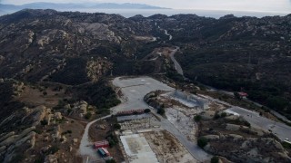 AX0157_051E - 7.6K aerial stock footage flying over the Rocketdyne aerospace testing facility in Brandeis, California