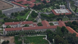 7.6K aerial stock footage orbiting Bishop Alemany High School, Mission Hills, California Aerial Stock Footage | AX0157_082