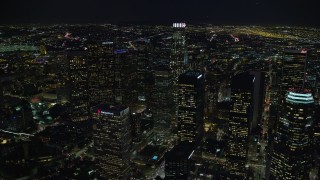 7.6K aerial stock footage flying by skyscrapers at night, and approach US Bank Tower, Downtown Los Angeles, California Aerial Stock Footage | AX0158_120