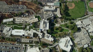 7.6K aerial stock footage orbiting away from College of the Canyons campus, Santa Clarita, California Aerial Stock Footage | AX0159_015E