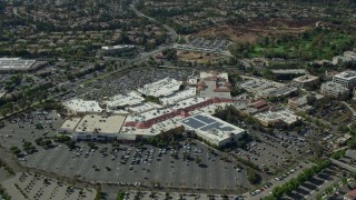 7.6K aerial stock footage of a reverse orbit of a shopping mall and parking lot, Santa Clarita, California Aerial Stock Footage | AX0159_028E