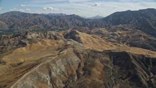 7.6K aerial stock footage flying over Canyon Country and houses, California Aerial Stock Footage | AX0159_052E