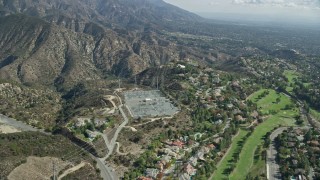 7.6K aerial stock footage of a power station near a country club, La Cañada Flintridge, California Aerial Stock Footage | AX0159_065