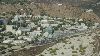 7.6K aerial stock footage of a Jet Propulsion Laboratory campus against the hillside, Pasadena, California Aerial Stock Footage | AX0159_080