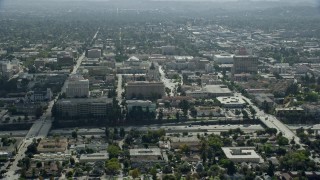 7.6K aerial stock footage flying by Pasadena City Hall, office buildings, and 134 freeway, Pasadena, California Aerial Stock Footage | AX0159_101E