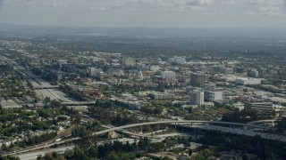 7.6K aerial stock footage of Pasadena City Hall and office buildings across the 134 freeway, Pasadena, California Aerial Stock Footage | AX0159_103