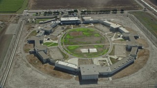 AX0159_148E - 7.6K aerial stock footage of East Yard of the California Institution for Men, Chino, California