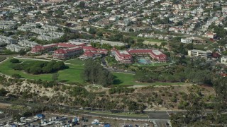 7.6K aerial stock footage orbiting and approaching Laguna Cliffs Marriott Resort & Spa in Dana Point, California Aerial Stock Footage | AX0159_195E