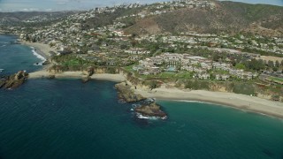 AX0159_207 - 7.6K aerial stock footage of Treasure Island Beach and Montage Laguna Beach hotel in Laguna Beach, California