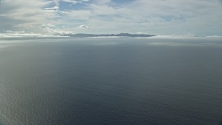 7.6K aerial stock footage approaching Catalina Islands, Santa Catalina Island, California Aerial Stock Footage | AX0159_240